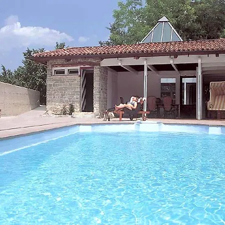Сasa de vacaciones With Large Covered Terrace, In Small With Swimming Pool